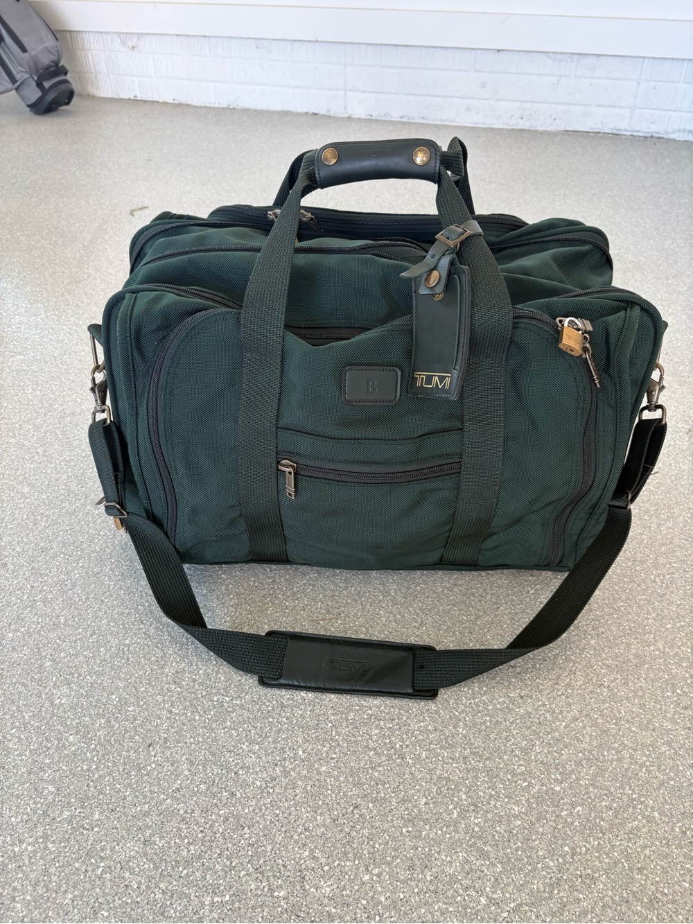 TUMI double expansion carry on travel bag, 22”wide, 10”deep, 15”tall with locks